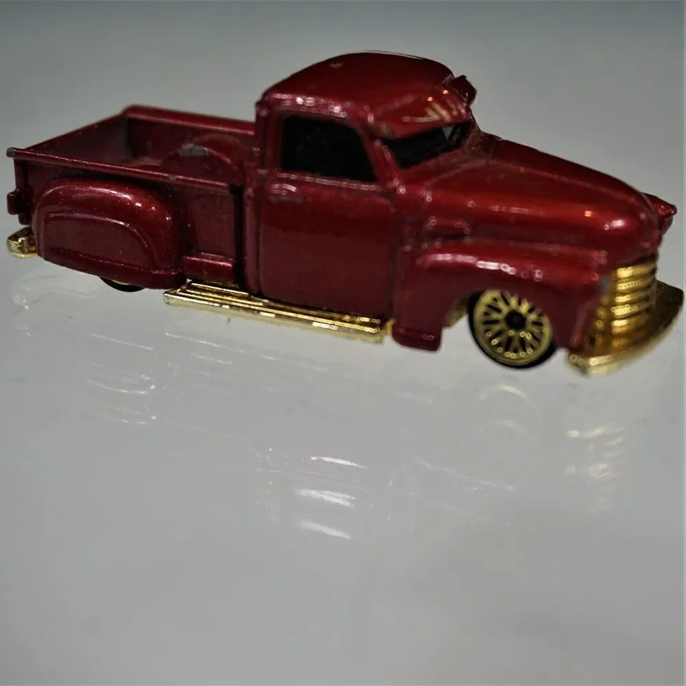 Vintage 2000 Hotwheels La Troca GM TM Red Gold Diecast Toy Car